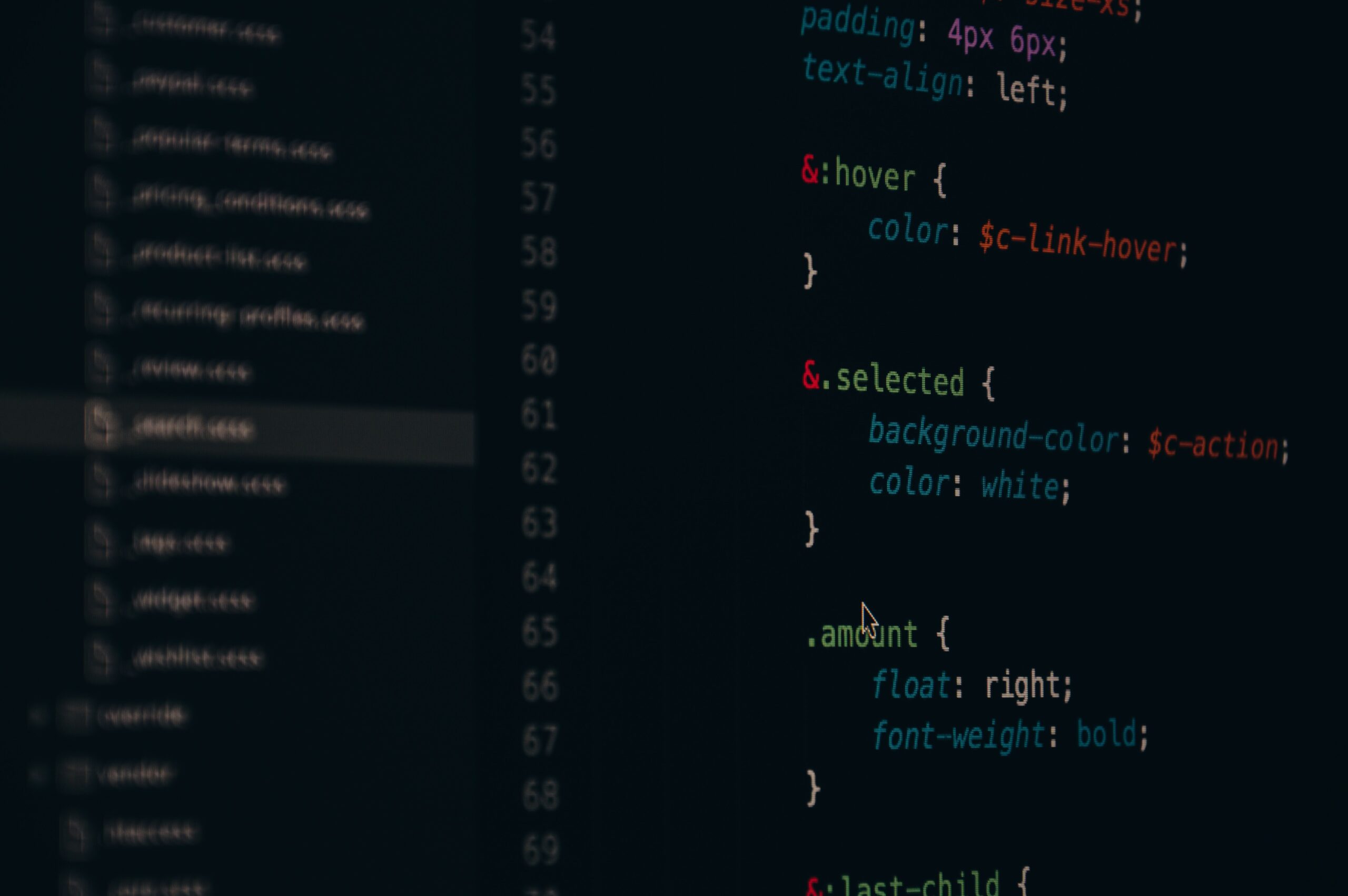 Primer plano de código SCSS en una pantalla de ordenador, ilustrando la propiedad intelectual y el código fuente del software. Primer plano de código SCSS en una pantalla de ordenador, ilustrando la propiedad intelectual y el código fuente del software.